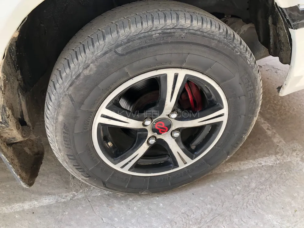 Goodlander tyres with alloy rims in almost new condition Image-1