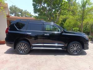 Toyota LandCruiser Prado TX-L 
Black night package 
Model 2019 fresh import June 2024
Mileage 23000 km 
Brand new condition ( spotless)
Black with black nappa leather interior
Electric glass Sunroof 
Multi power seats 
Front seats air conditioned & heated 
Five seater 
Eight zone climate control duel air conditioning 
Active cruise control 
Adapter Line accessed 
Adapted Radar
Bang & 0lufsen entertainment sound system 
Active navigation ,Bluetooth ,Apple play & android smart apps 
Multi cameras front & rear 
Four colour ambient light 
Cool box
TRD original factory fitted sports led body kit 
Sports side skirts 
19 “alloy wheels with new tyres 
Active power led headlamps 
TRD duel muffler 
Wooden steering wheel & full glossy wooden interior.
Further information please call & visit at Victory Cars jail road Lahore 
National wide delivery available.