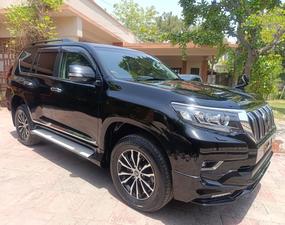 Toyota LandCruiser Prado TX-L 
Black night package 
Model 2019 fresh import June 2024
Mileage 23000 km 
Brand new condition ( spotless)
Black with black nappa leather interior
Electric glass Sunroof 
Multi power seats 
Front seats air conditioned & heated 
Five seater 
Eight zone climate control duel air conditioning 
Active cruise control 
Adapter Line accessed 
Adapted Radar
Bang & 0lufsen entertainment sound system 
Active navigation ,Bluetooth ,Apple play & android smart apps 
Multi cameras front & rear 
Four colour ambient light 
Cool box
TRD original factory fitted sports led body kit 
Sports side skirts 
19 “alloy wheels with new tyres 
Active power led headlamps 
TRD duel muffler 
Wooden steering wheel & full glossy wooden interior.
Further information please call & visit at Victory Cars jail road Lahore 
National wide delivery available.