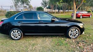 Mercedes-Benz C180 avantgrade-S  package ( twin turbo charged)
Model 2019 ( original facelift)
Registered Islamabad 2020
Shahnawaz import 
Mileage 13000
Brand New condition ( bumper to bumper original & spotless)
Full service history in shahnawaz Lahore. Only one moter oil changed.
Colour Black with beige nappa leather interior.
Top of line specs.
Electric Panoramic sunroof 
Premium entertainment sound system 
Electric power seats 
8 zone climate control air conditioning 
54 colours ambient interior lighting 
Adapted cruise control 
360 degrees cameras
Auto Parktronic access 
Multi drivetonic sensors
Multiple driving selection 
LED adapter headlights 
Apple CarPlay & android apps 
Crome line  packages 
18” alloy wheels 
Privacy glass 
Further information please call & visit Victory Cars jail road Lahore.
National wide delivery available.