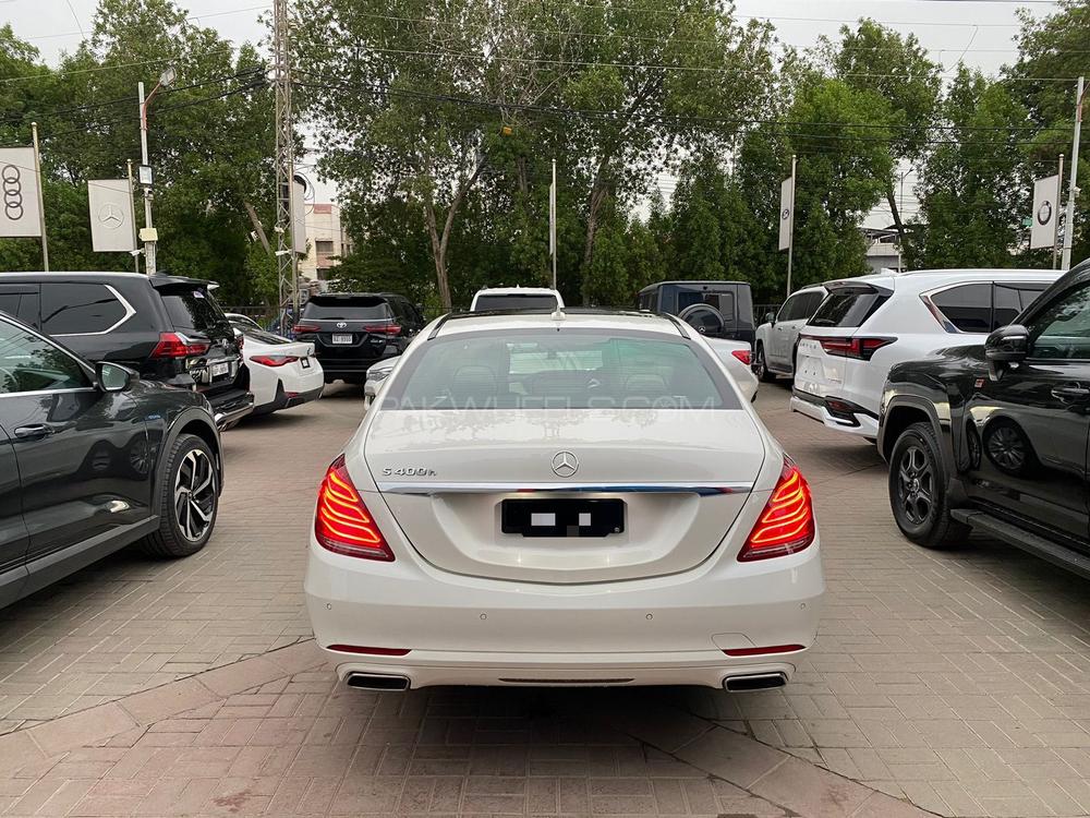 Mercedes Benz S400h 
Model: 2018
Reg: 2018 Karachi
Mileage: 40,700 kms 
Shahnawaz Import & Maintained

Equipment package: Executive 
Diamond White with two tone interior
Panoramic sliding roof 
Long wheel base 
360 degree camera 
Heated + memory seats 
Rear + side curtains 
Sun protection package
Dynamic LED Headlamps
Air Quality package
Rear Entertainment Package
Parking Assist
Ambient Lighting Package
Black Headliner Interior Trim
Memory Rear seat
Trim Pieces Wood Burred Walnut veneer
Premium Sound System- Burmester

Calling and Visiting Hours 

Monday to Saturday

11:00 AM to 7:00 PM