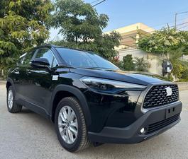 TOYOTA COROLLA CROSS 1.8 HEV X TOP OF THE LINE (1800cc) ZERO METER
Model 2024 | Registered 2024
Black Color
Top of the line
Brand New 
Ready Delivery 
Exchange possible with any car

For inspection
Available at SUPREME CARS
Plot # 151/F,Under Imam heights,Shop no.1&2, Main Khalid Bin Walid Rd, Karachi, Sindh 75400

|  Premium Cars |  Best Prices |  Optimum Performance | 
#supremecarsgang
