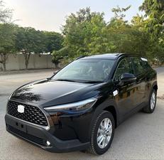 TOYOTA COROLLA CROSS 1.8 HEV X TOP OF THE LINE (1800cc) ZERO METER
Model 2024 | Registered 2024
Black Color
Top of the line
Brand New 
Ready Delivery 
Exchange possible with any car

For inspection
Available at SUPREME CARS
Plot # 151/F,Under Imam heights,Shop no.1&2, Main Khalid Bin Walid Rd, Karachi, Sindh 75400

|  Premium Cars |  Best Prices |  Optimum Performance | 
#supremecarsgang