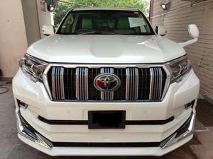 Toyota Prado TXL 2700cc
Model 2021 fresh import 2024
Unregistered 
5AA auction sheet
Pearl white with beige leather interior 
7 seater with sunroof 
Full body kit 
Further information please call & visit at Victory Cars jail road Lahore.