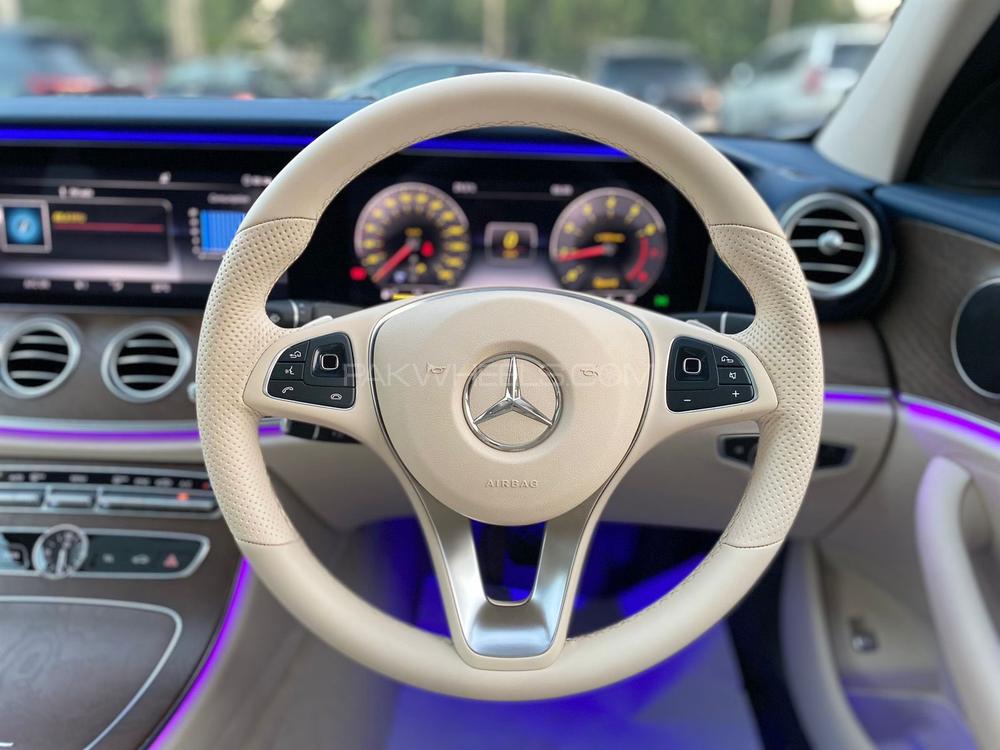 Mercedes E200 Exclusive 
Model: 2018
Mileage: 5,500 Km
Reg: 2018 Khi

*Blue dashboard  
*Panoramic glass sunroof
*Ambient lighting 
*Digital instrument cluster
*Customised steering wheel on order from Shahnawaz 
*Shahnawaz import and maintained

Calling and Visiting Hours. 

Monday to Saturday

11:00 AM to 7:00 PM