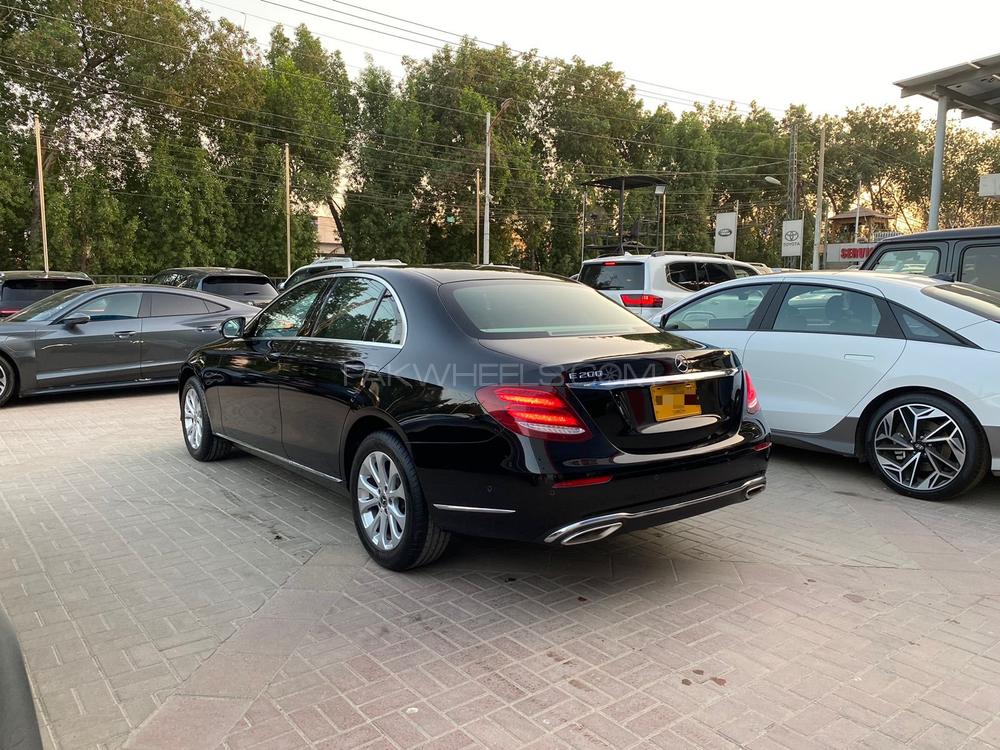 Mercedes E200 Exclusive 
Model: 2018
Mileage: 5,500 Km
Reg: 2018 Khi

*Blue dashboard  
*Panoramic glass sunroof
*Ambient lighting 
*Digital instrument cluster
*Customised steering wheel on order from Shahnawaz 
*Shahnawaz import and maintained

Calling and Visiting Hours. 

Monday to Saturday

11:00 AM to 7:00 PM