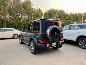 Mercedes Benz G63 AMG
V8 4.0 litre Biturbo
Model year 2020
Manufacturing Year 2019 end 
Fresh Import 2024
Milage 19000km 
Japan import
Satin black colour with red napa leather interior 


OPTIONS
•Active Lane Keeping Assist
•Red AMG brake callipers 
•Blind Spot Monitor
•Driver Assistance package Plus
•Smartphone integration CarPlay
•Sunroof
•Ambient lighting 
•Digital instrument cluster 
•360° camera
•Wider wheel arch for AMG wheels
•Parking package
•Switchable exhaust system
•AMG Performance steering wheel
•AMG Speedshift Plus 9G-Tronic
and many more options

Calling and Visiting Hours

Monday to Saturday

11:00 AM to 7:00 PM