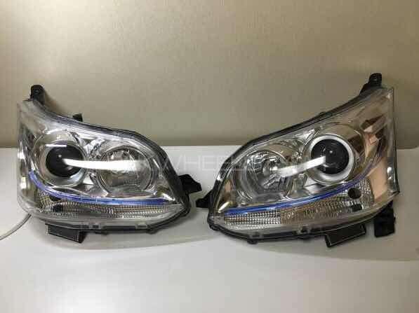 DAIHATSU MOVE HEAD LIGHTS PAIR Image-1