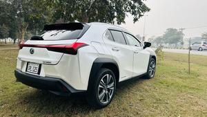 Lexus UX300e ( EV ) ultra luxury plus takumi package 
Model 2021/11 production fresh import 2024 from Japan.
Brand new vehicle ( spotless condition )
Pearl diamond metallic white with brono nappa leather interior.
Mileage 3000 km
Auction grade: 5AA
Battery range 375 km
Top of the Line specs.
All wheel drive ( AWD )
All seat heated & ventilated air conditioned 
Heated steering wheel 
Electric telescope steering wheel 
Memory & multi power electric seats 
Head up display 
Blind spot monitor ( BSM )
Lane  assistance 
3 mode driving modes
Lambs support 
Voice activation assistance 
Glass electric Sunroof 
Wireless charger 
Mark luvinson surround sound entertainment system with 15 speakers 
Privacy glass 
Power boot
Google maps & Apple CarPlay 
Adapted cruise control 
Adapted Radar
Airmatic electric sports suspension 
Parktronic sensors all sides
Auto pilot 
7 cameras 360 degrees 
18 “ Lexus note black Crome L sport alloy wheels.
Adapted auto laser active led headlamps 
11 kw charger