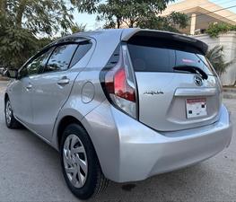 TOYOTA AQUA S KEY START MULTI PACKAGE NEW SHAPE (1500cc)
Model 2015 || Registered 2019 end
Silver Color
1/2 pc touchup 
99,000 KMS Driven
New Blue Interior
Climate control A/c
Multi Steering
100% BATTERY AND ABS  
Radar 
Interior is as crispy as new 
Still Smells Like New 
Extremely good condition 
Just like a brand new car
EXCHANGE POSSIBLE WITH ANY CAR
 
For inspection
Available at SUPREME CARS
Plot # 151/F,Under Imam heights,Shop no.1&2, Main Khalid Bin Walid Rd, Karachi, Sindh 75400

|  Premium Cars  |  Best Prices  |  Optimum Performance | 
#supremecarsgang