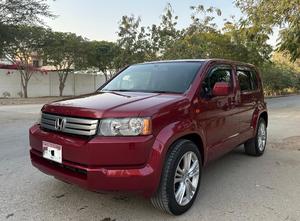 HONDA CROSSROAD 1.8 L X PACKAGE TOP OF THE LINE (1800CC) 7 Seater
Model 2010 end || Registered 2015
ONLY 120,000 KM DRIVEN 
Wine Red Color
Bumper To Bumper Original 100% Guaranteed 
Original TV BACK CAM
Multis Steering 
Lexus Rims Installed
As good as brand new
Extremely well maintained 
Just like new

For inspection 
Available at SUPREME CARS
Plot # 151/F,Under Imam heights,Shop no.1&2, Main Khalid Bin Walid Rd, Karachi, Sindh 75400

|  Premium Cars  |  Best Prices  |  Optimum Performance | 
#Supremecarsgang