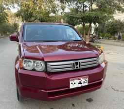 HONDA CROSSROAD 1.8 L X PACKAGE TOP OF THE LINE (1800CC) 7 Seater
Model 2010 end || Registered 2015
ONLY 120,000 KM DRIVEN 
Wine Red Color
Bumper To Bumper Original 100% Guaranteed 
Original TV BACK CAM
Multis Steering 
Lexus Rims Installed
As good as brand new
Extremely well maintained 
Just like new

For inspection 
Available at SUPREME CARS
Plot # 151/F,Under Imam heights,Shop no.1&2, Main Khalid Bin Walid Rd, Karachi, Sindh 75400

|  Premium Cars  |  Best Prices  |  Optimum Performance | 
#Supremecarsgang