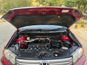 HONDA CROSSROAD 1.8 L X PACKAGE TOP OF THE LINE (1800CC) 7 Seater
Model 2010 end || Registered 2015
ONLY 120,000 KM DRIVEN 
Wine Red Color
Bumper To Bumper Original 100% Guaranteed 
Original TV BACK CAM
Multis Steering 
Lexus Rims Installed
As good as brand new
Extremely well maintained 
Just like new

For inspection 
Available at SUPREME CARS
Plot # 151/F,Under Imam heights,Shop no.1&2, Main Khalid Bin Walid Rd, Karachi, Sindh 75400

|  Premium Cars  |  Best Prices  |  Optimum Performance | 
#Supremecarsgang
