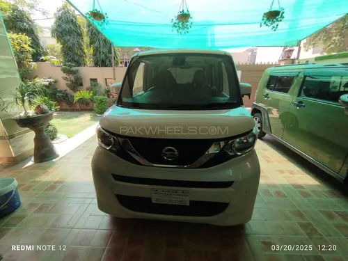 Slide nissan roox 2021 118542521