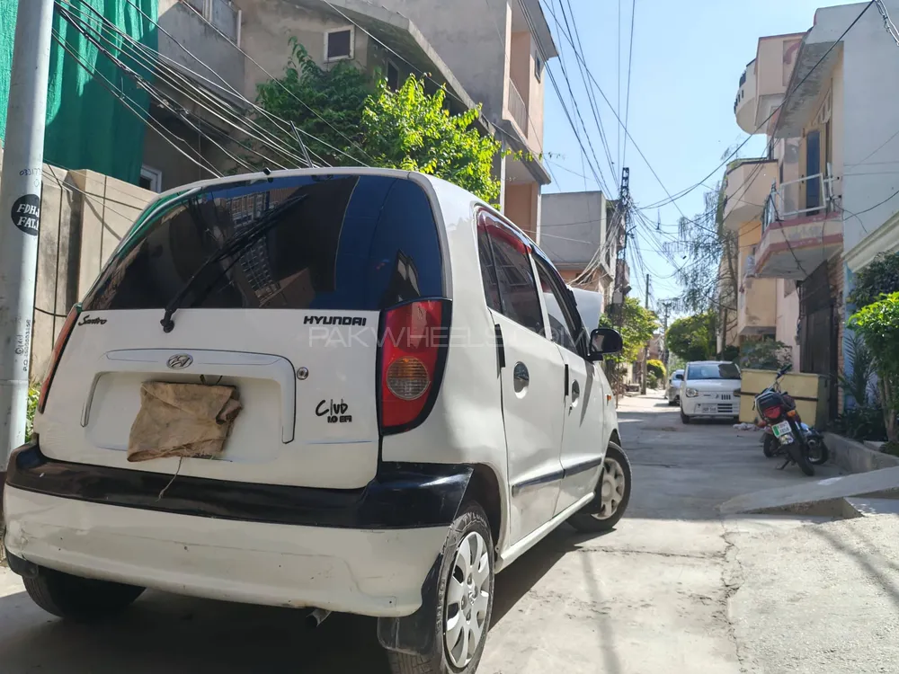 Daihatsu Cuore 2004 for Sale in Faisalabad Image-1