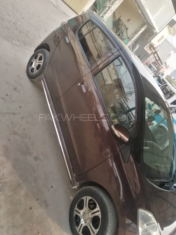 Daihatsu Mira Gino 2011 for Sale in Kallar Saddiyian Image-1