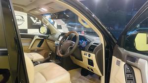 Toyota LandCruiser Prado TXL 2700cc eco/pro.
Model 2020 import April 2025
Brand New vehicle ( spotless condition )
Mileage 49000 km
Auction grade 4.5 A 
Silky black with ash white interior 
Top of the line specs,
All 7seats nappa leather 
Heated & ventilated ( air conditioning) seat 
Glass electric sunroof 
All zone climate control air conditioning 
Adapted Radar 
Active line accessed & blind spot monitor.
Adaptive cruise control 
Premium sound system with 16 speakers 
Cool box 
Full trd original body kit 
19” alloy wheels 
Crome package 
Further information please call & visit at Victory Cars jail road Lahore