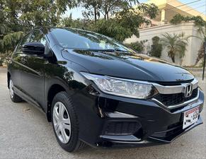 HONDA CITY 1.2L CVT (1200cc) AUTOMATIC 
Model 2024 || Registered 2024
8,000 KM Driven verifiable
HONDA SHAHRAH E FAISAL MAINTAINED 
Bumper To Bumper Original 100% 
Pearl Black Color 
Beige room
Interior is as good as new
COMPANY SEALS STILL INTACT
Original NAVIGATION 
ECON Mode
Like a brand new car

For inspection
Available at SUPREME CARS
Plot # 151/F,Under Imam heights,Shop no.1&2, Main Khalid Bin Walid Rd, Karachi, Sindh 75400

|  Premium Cars  |  Best Prices  |  Optimum Performance | 
#Supremecarsgang