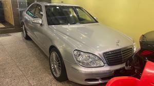 Mercedes-Benz S350 3700cc V6
Model 2004 ( production 2003/12 )
Import from Japan 2007 registered 2010 in Islamabad 
First owner driven 
Mileage  72000
Excellent condition ( original paint & spotless)
Metallic silver colour & black nappa leather interior.
Top of the line specs.
Sunroof, multi power seats, heated seats, massager seats, electric curtains, aromatic suspension, Xinon headlights, electric boot, cool box , premium sound system. Duel climate control air conditioning.
Further information please call & visit at Victory Cars jail road Lahore