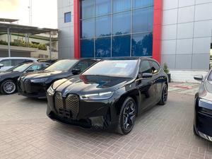 BMW iX Xdrive 50
Model: 2023
Mileage: 3,800 km
Un-Registered 
Japan Import

One & Only with 
530 Hp & 550 km Range

Black sapphire Metallic Colour 
with Tan Interior

*Wireless Apple carplay and android auto
*LED headlights 
*Ambient lights
*Four-zone climate control
*Comfort Access keyless entry 
*Bowers and wilkins sound System
*14.9-inch touchscreen infotainment system
*Active steering
*Soft closing doors
*BMW Natural Interaction voice assistant
*22-inch alloy wheels
*Front massage seats
*Panoramic glass roof sky lounge with electrochromatic shade function

Calling and Visiting Hours

Monday to Saturday

11:00 AM to 7:00 PM