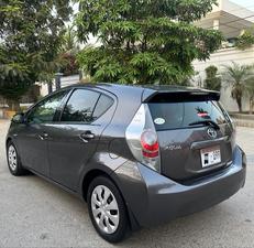 TOYOTA AQUA S PUSH START MULTI PACKAGE TOP OF THE LINE (1500cc)
Model 2013 || Registered 2016 end
Gun metallic  Color
Beige Interior 
Only Half Fender Repainted Rest 100% Full Original Paint 
88,000 km driven
Push start 
Climate control A/c
Multi Steering
Original TV back camera
100% BATTERY AND ABS  
Interior is as crispy as new 
Extremely good condition 
Just like a brand new car
EXCHANGE POSSIBLE WITH ANY CAR
 
For inspection
Available at SUPREME CARS
Plot # 151/F,Under Imam heights,Shop no.1&2, Main Khalid Bin Walid Rd, Karachi, Sindh 75400

|  Premium Cars  |  Best Prices  |  Optimum Performance | 
#supremecarsgang