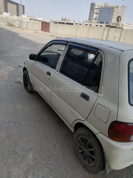 Daihatsu Cuore 2011 for Sale in Karachi Image-1