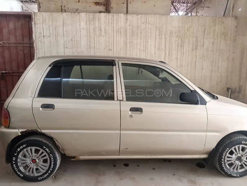 Daihatsu Cuore 2011 for Sale in Karachi Image-1