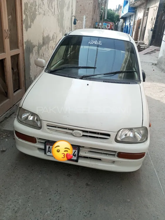 Daihatsu Cuore 2004 for Sale in Faisalabad Image-1