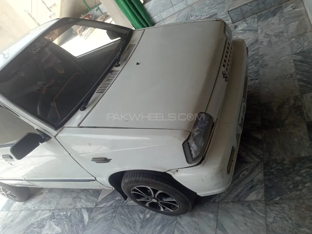 Suzuki Mehran 2012 for Sale in Faisalabad Image-1