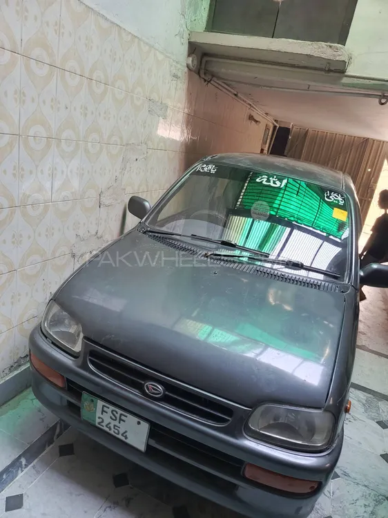 Daihatsu Cuore 2004 for Sale in Faisalabad Image-1