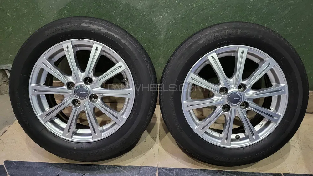 Toyota Aqua Millous lightweight Alloys & Bridgestone Tyres Image-1