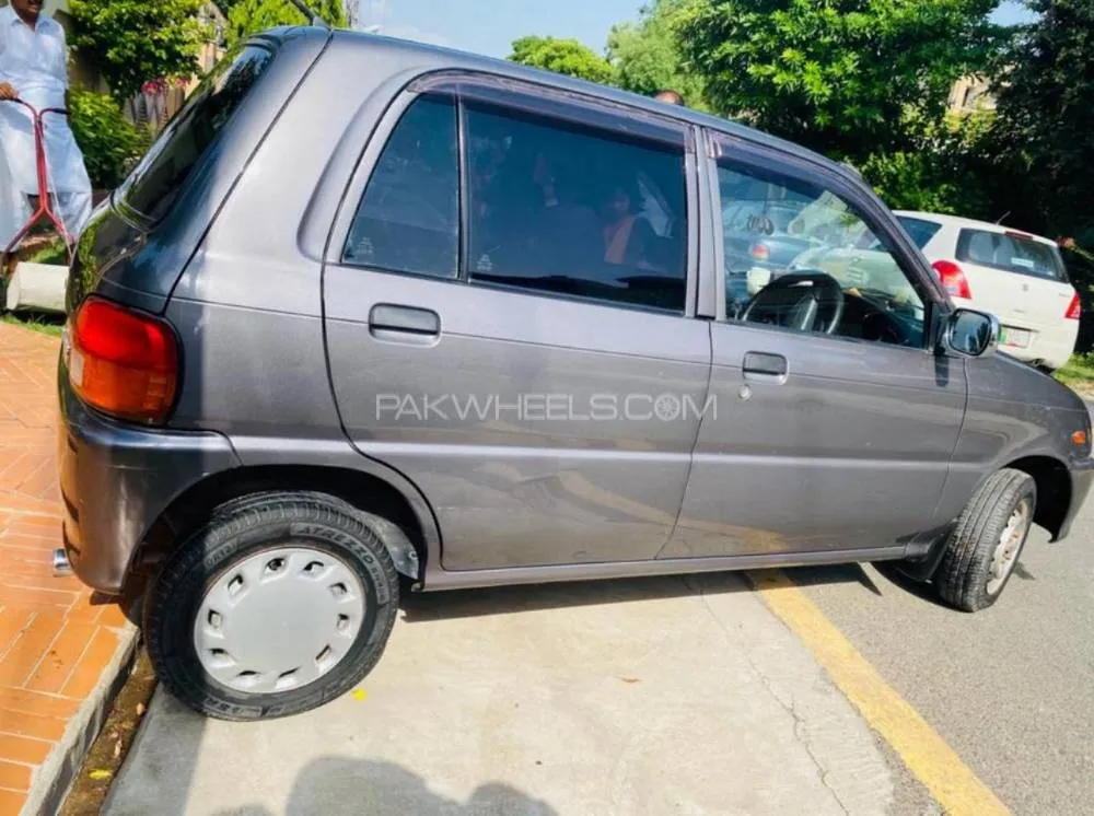 Daihatsu Cuore 2012 for Sale in Lahore Image-1
