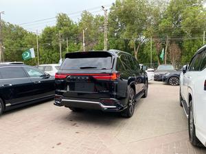 Lexus Lx 600 v6 twin turbo 
Model: 2022
Mileage: 7,700 km
Unregistered 
Fresh Import 2025 

Luxury variant:
*Finger print start button 
*Color heads up display
*Okudake (Wireless) charger 
*Back auto door 
*Rear view camera
*Under view camera 
*Rear entertainment 
*Mark levinson 3D sound system 
*Front & rear ventilated seats 
*Heating/Cooling seats
*Sunroof
*Radar
*7 seater

Calling and Visiting Hours

Monday to Saturday

11:00 AM to 7:00 PM