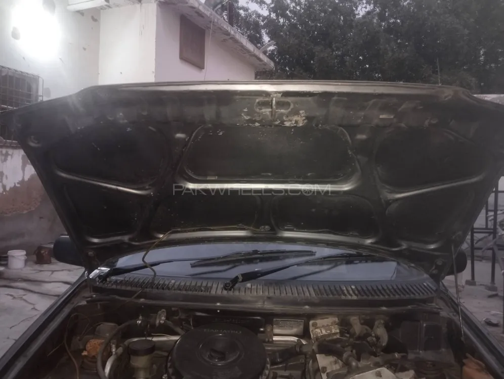 Daihatsu Cuore 2004 for Sale in Karachi Image-1