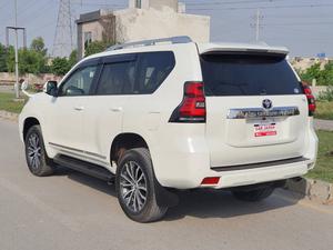Fresh Import 2025
TX L Package
2020 Model
Very Low Mileage: 9672 KM
Shiny Pearl White Colour 
(Leather Electric Heating & Cooling Seats)
Colour: Pearl White
Beige Interior
7 Seats
19 Inches Original Alloy Rims
Sunroof
Toyota Genuine Navigation System
Toyota Genuine TV
Toyota Genuine Back Camera
No.1 Japan Quality
5 AA Auction Grade And Genuine Verifiable Auction Sheet
Auction Sheet Attach For Satisfaction And Verification
Modelista Genuine Body Kit (Front & Back)
Genuine New Model
Genuine New Interior
Prado Super Live Sound System
14 Speaker
Shiny Pearl White Color
Intelligent Entertainment
Digital TV
Led Head Lamp
100% Original
4WD,ETC
Multi-Function Steering Controls
Fog Lamps
Genuine New Front Grill
Steering Gear Type: Rack & Pinion Type With Power Assist
Retractable Side Mirrors With Indicators
All Windows Full Automatic (One Touch Up/down)
Immobilizer (Anti-theft)
Digital Climate Control A/c & Heater
Rain Visors
8 Airbags