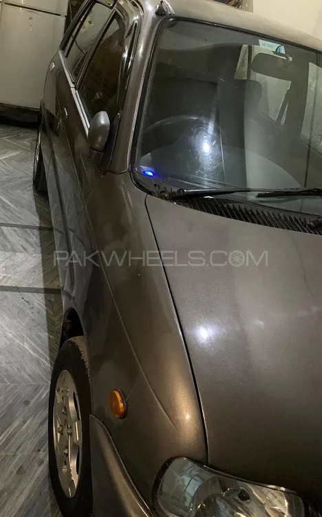 Daihatsu Cuore 2003 for Sale in Faisalabad Image-1