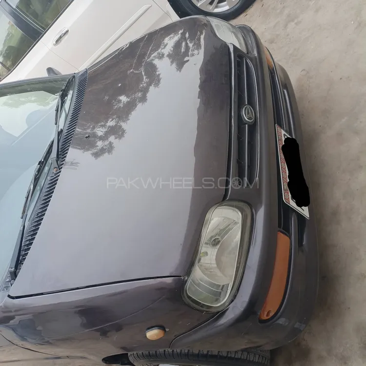 Daihatsu Cuore 2012 for Sale in Karachi Daihatsu Cuore 2012 for Sale in Karachi Image-1