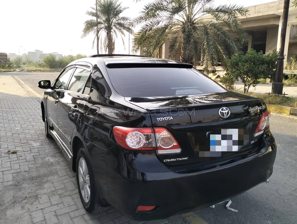 Toyota Corolla 2013 for Sale in Faisalabad Toyota Corolla 2013 for Sale in Faisalabad Image-18