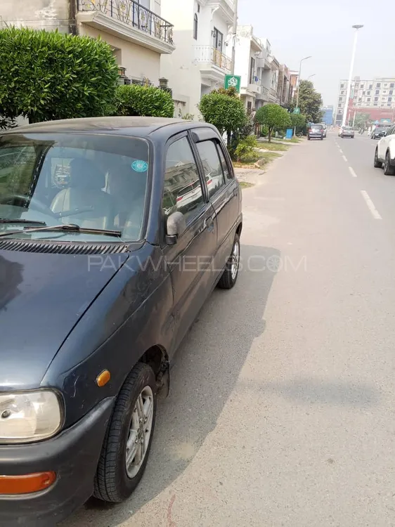 Daihatsu Cuore 2004 for Sale in Lahore Daihatsu Cuore 2004 for Sale in Lahore Image-1