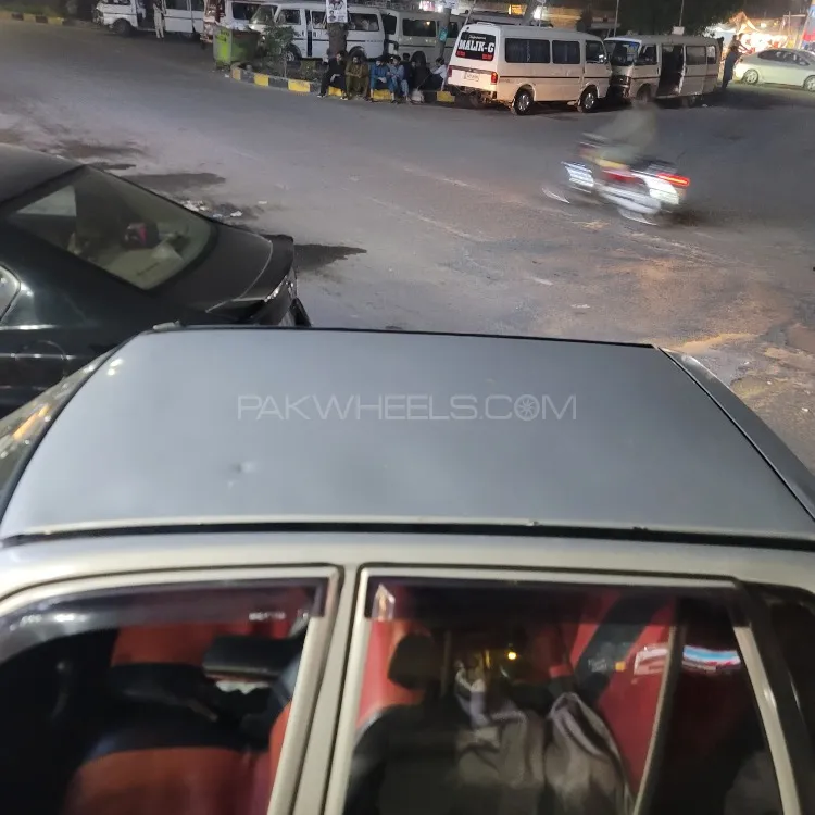 Suzuki Mehran 2003 for Sale in Faisalabad Suzuki Mehran 2003 for Sale in Faisalabad Image-1