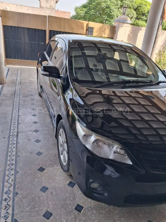 Toyota Corolla 2014 for Sale in Mandi bahauddin Toyota Corolla 2014 for Sale in Mandi bahauddin Image-1