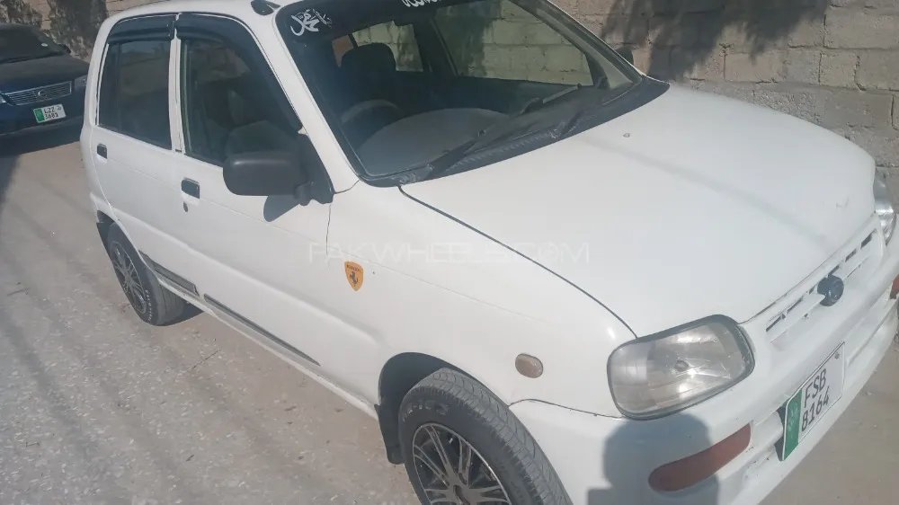 Daihatsu Cuore 2004 for Sale in Peshawar Image-1