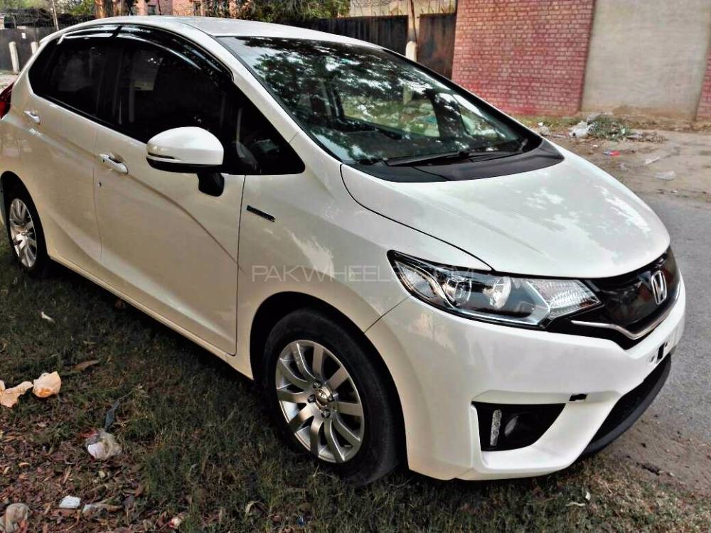 honda fit hybrid запаска под батареей honda fit hybrid запаска под батареей