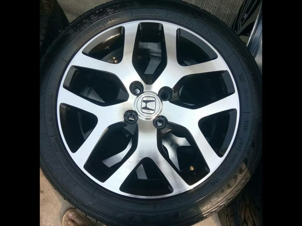 16” Honda City OEM Alloy Rims + Bridgestone 195/55r16 Image-1