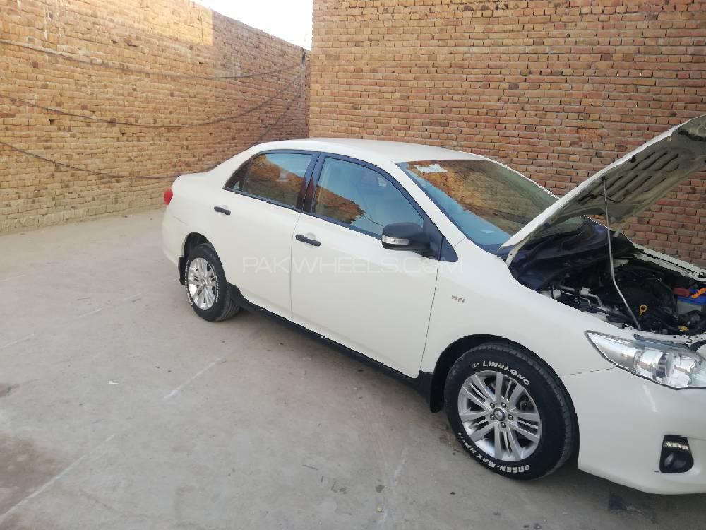 Toyota Corolla 2013 for Sale in Faisalabad Toyota Corolla 2013 for Sale in Faisalabad Image-9