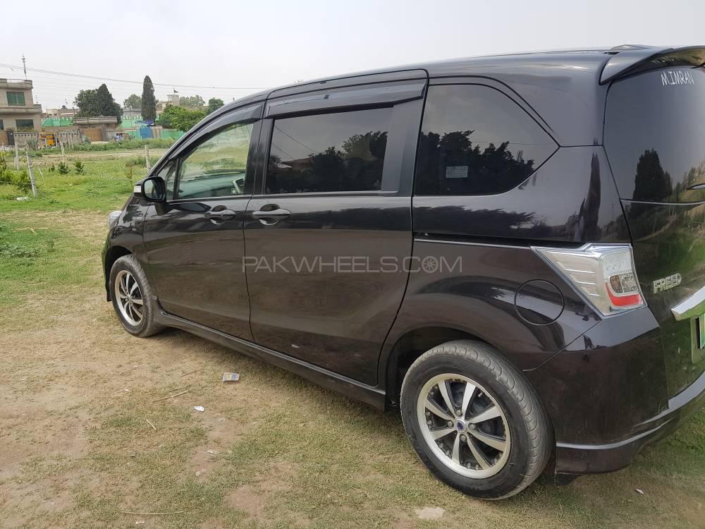 Honda freed 2012 гибрид