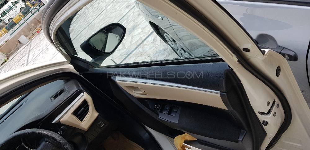 Toyota Corolla 2014 for Sale in Peshawar Toyota Corolla 2014 for Sale in Peshawar Image-4