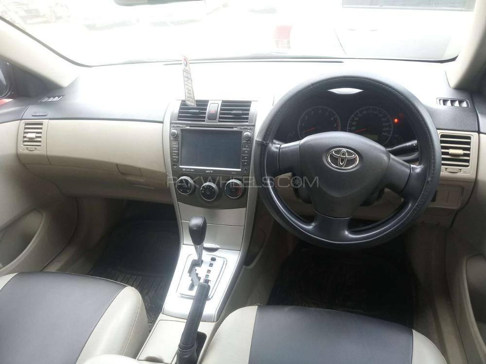 Toyota Corolla 2014 for Sale in Faisalabad Toyota Corolla 2014 for Sale in Faisalabad Image-11