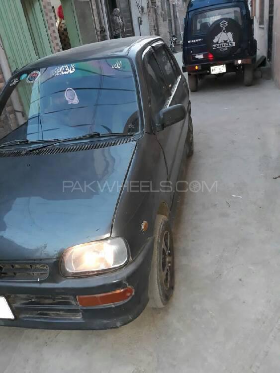 ڈائیہاتسو کیور - 2004 coure ڈائیہاتسو کیور - 2004 coure Image-2