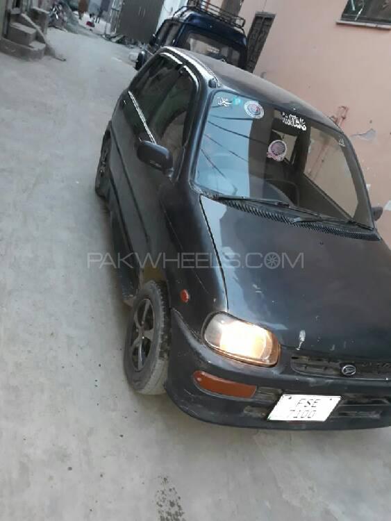 ڈائیہاتسو کیور - 2004 coure ڈائیہاتسو کیور - 2004 coure Image-3